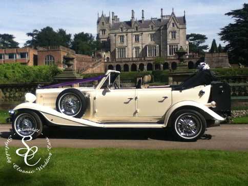 Beauford wedding car in the gardens of Lilleshall Hall.