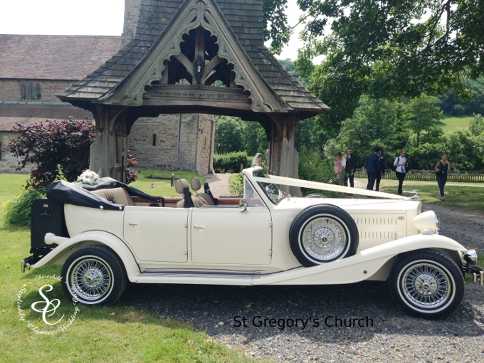 Beauford wedding car outside the main gate to St Gregory's Church in Moreville.