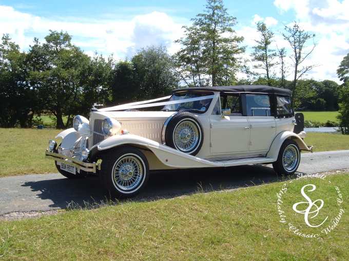 Beauford wedding car on the drive to Somerford Hall